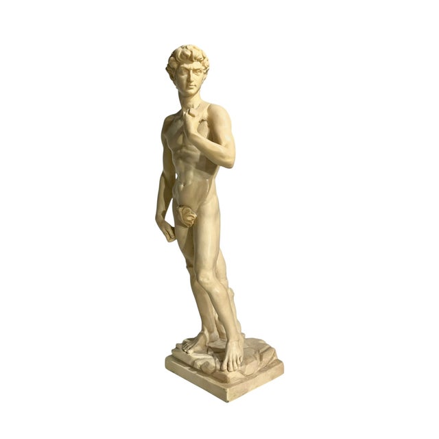 A timeless vintage sculpture inspired by Michelangelo’s iconic David, crafted in Italy with elegant Classical Roman...