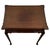 An elegant early 20th-century English side table, finely crafted from mahogany and distinguished by its beautifully shaped...