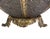 Pair of decorative table lamps crafted from embossed and formed brass sheet, featuring globe-form bodies with elaborate...