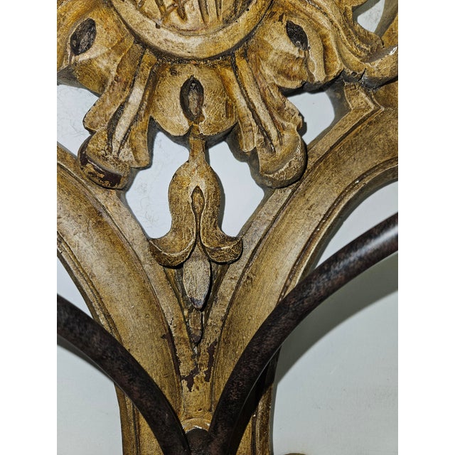 Charming European Style carved wall sconces with intentional distressed paint. 2 arm iron pricket candleholers on each...