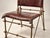 A striking vintage iron and leather chair with true character and presence. The frame is crafted from hand-forged iron...