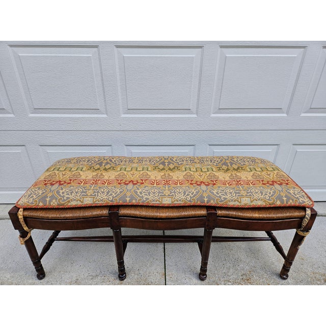 A beautiful rush three seat bench with a kilim-style upholstered cushion on top. The seat itself is elegant and well made,...