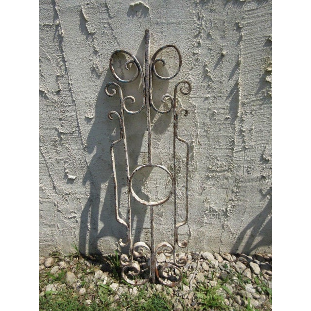 Wonderful piece of architecture. Heavy, tight and sturdy, piece does show signs of age related wear including rust,...