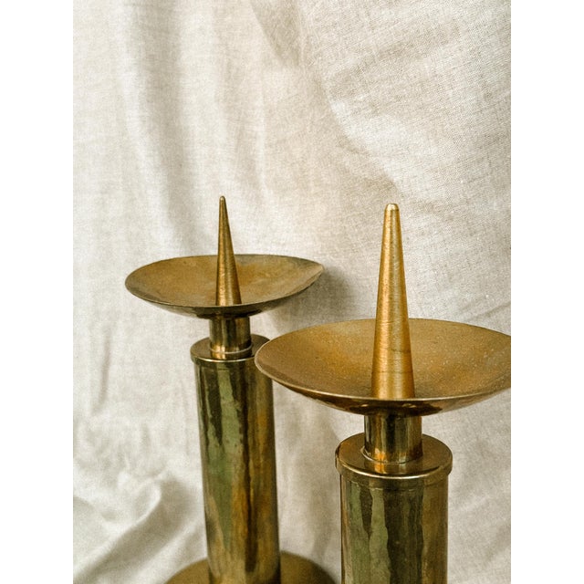 This pair of solid brass candlesticks evokes the serene elegance of times past. Inspired in Brutalism, with clean lines...