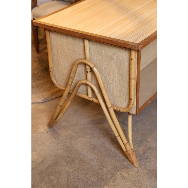 A small and charming three-drawer bamboo desk and chair from France. The desk is constructed of wood and fiber board with...