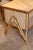 A small and charming three-drawer bamboo desk and chair from France. The desk is constructed of wood and fiber board with...