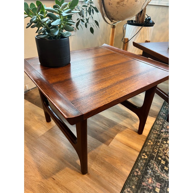 Solid wood, made in Japan. These are Japanese mid-century modern stacking snack tables from the 1960s. While most people...