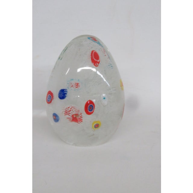 This wonderful Paper Weight is made of art glass. This stunning vintage piece features a colorful millefiori pattern of...