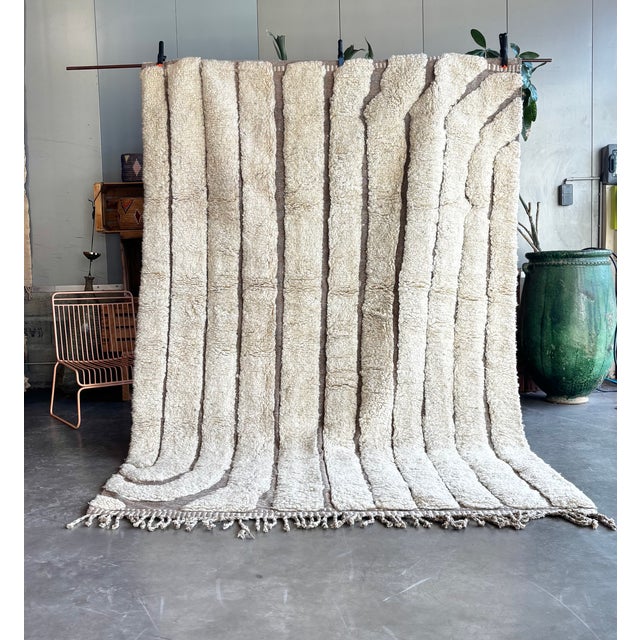 This exceptional Beni M’Rirt rug is a refined example of contemporary Moroccan textile craftsmanship, handwoven in the...