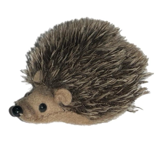 Adorable tiny hedgehog. Felt face, ears and bottom, stripes on muzzle, black bead eyes and nose. Although the tag has been...