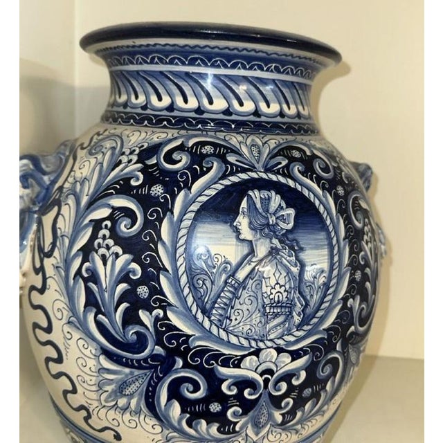Bring a touch of classic Mediterranean elegance to your home with this striking vintage Italian majolica urn, hand-painted...