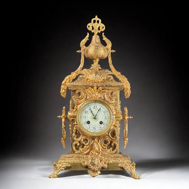 An impressive and richly ornamented French mantel clock executed in the exuberant Louis XV Revival taste, dating to the...