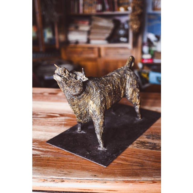 A unique work of art—a bronze and iron bull created by Bergamo artist Ivan Cattaneo. It measures 32 x 18 cm at the base...