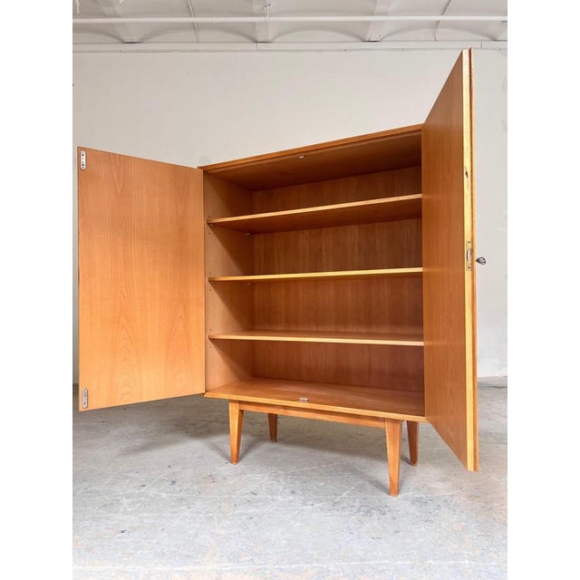 This Type 602/B cabinet is a significant piece of German design history, designed by Franz Ehrlich for the renowned...