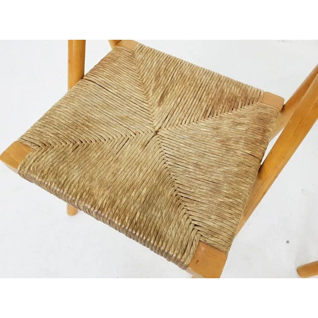 2 beech folding chairs with rush seats. Some bolts are not original.