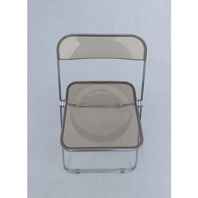 Plia Folding Chair by Giancarlo Piretti for Castelli, in Good conditions. Designed 1960 to 1969 This piece has an...