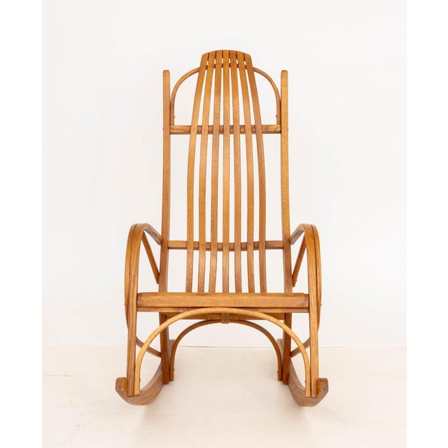 Adirondack Style Bentwood Oak Rocking Chair. 42" H x 22.5" W x 34" D; seat: 18" H. Provenance: From a 500 Park Avenue Estate.