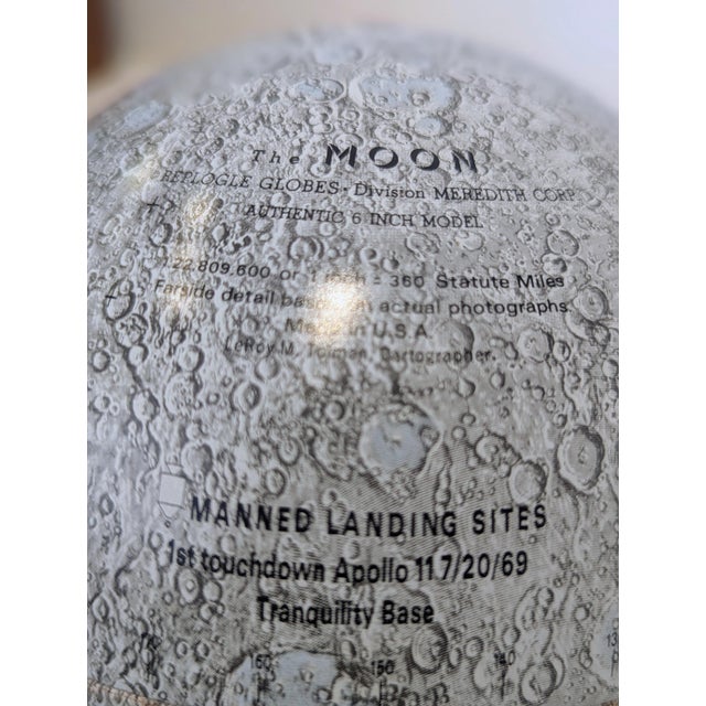 Post-Apollo lunar globe by Replogle Globes, Inc. Detailed greyscale mapping of the moon’s surface in a clean, Space Age form.