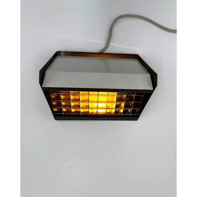 This wall lamp Model C-1573 from Raak Amsterdam was designed by the Raak design team (including Nanny Still-Mackinny,...