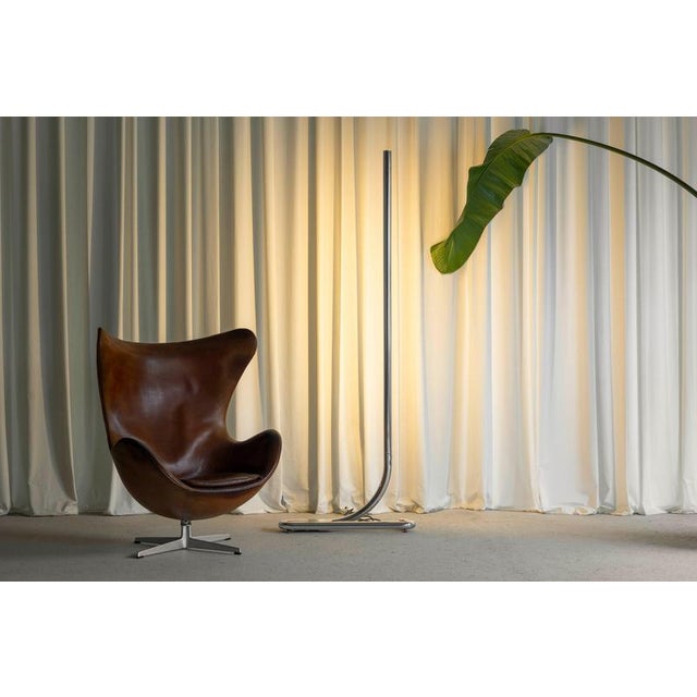 The tc2 floor lamp, designed by aldo van den nieuwelaar and manufactured by artimeta in the netherlands in 1972, is a...