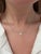An exquisite Tiffany & Co. necklace from their Soleste Collection, showcasing vibrant round brilliant cut diamonds...