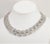 Modern Vintage 1960s Signed Monet Rhodium Plated Interlocking V Shapes Collar Necklace For Sale - Image 3 of 7