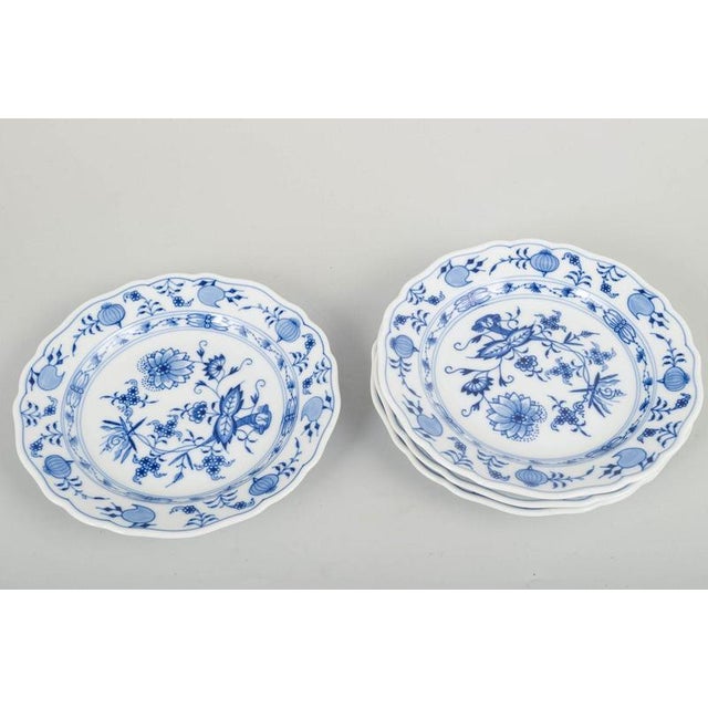Meissen Blue Onion 4 salad plates. Set of four Meissen plates in the classic Zwiebelmuster (Blue Onion) pattern, hand-...