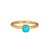 Stylish turquoise ring crafted in 18k yellow gold. Cabochon cut turquoise measures 4mm diameter. Turquoise is set into the...