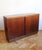 A beautifully restrained oak sideboard produced by UP Závody in Czechoslovakia in 1966. The cabinet is defined by its...