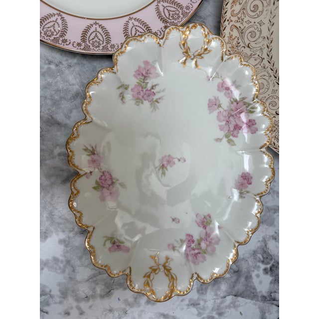 Vintage French porcelain china assorted set of floral and fruit design patterned plates in soft colors, pinks, violets,...