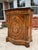 Early French Louis XV style console cabinet. Craftsmanship is indicative of late 1800s-early 1900s construction and is...