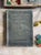 pair of primitive schoolbooks from the early 1900s, one book for english and the other for arithmetic. lovely to display...
