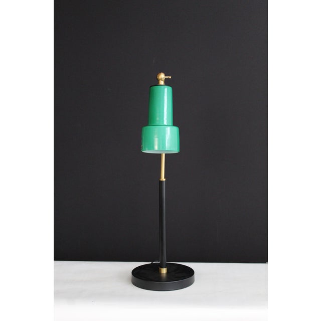 Simple and elegant design. Vistosi desk lamp. Beautiful turquoise Murano glass shade. Looks good illuminated or not....