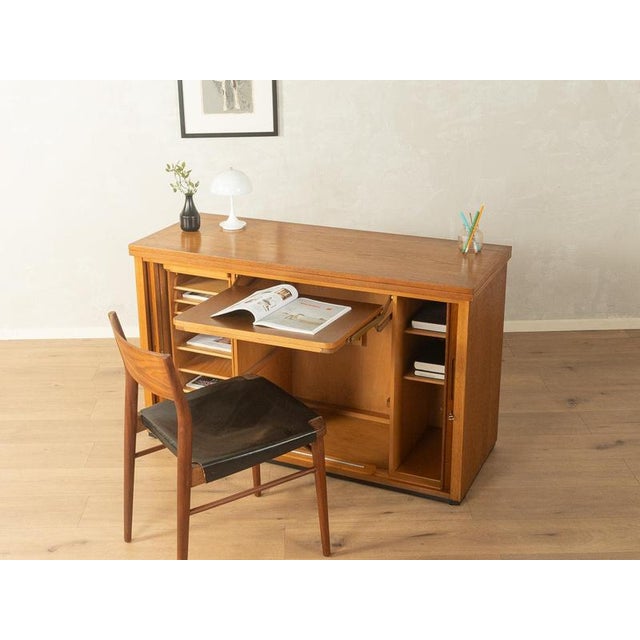 1960s Mid-Century Desk Very good craftsmanshipHigh-quality materialsSolid wood drawersMade in Germany Width: 127 cm...