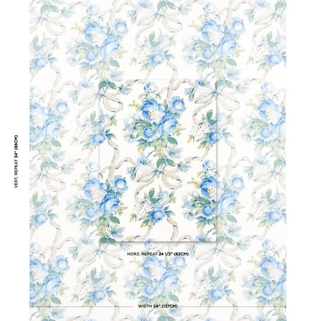 A classic combination of roses and ribbons, Queenie's Floral Chintz was inspired by a 1930s design. Handprinted on a...