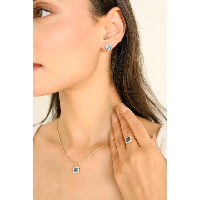 Square Blue Topaz Diamond Halo Earrings Pendant Ring Set in 18K Gold studded with square cut blue topaz with round cut...