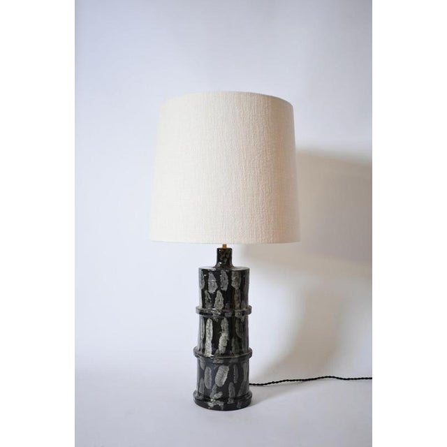 "Inle" 45cm grey and black ceramic table lamp, Barracuda edition. Height: 42 cm - 16.54 in Diameter: 20 cm - 7.87 in Up to...
