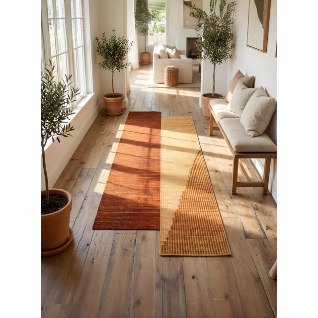 This runner rug, through its irregular shape, reflects a new way of assembling mats in 2 staggered bands, and reflects the...