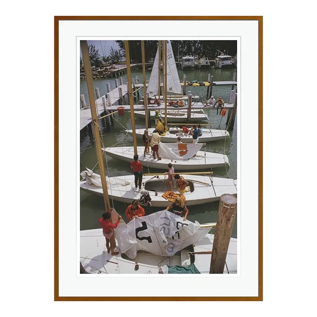 Freeport Yachts 1969 by Slim Aarons Brown Framed C Print For Sale