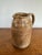 Lovely studio pottery pitcher, whose neutral color would set off a colorful bouquet of flowers brilliantly. Small artist’s...