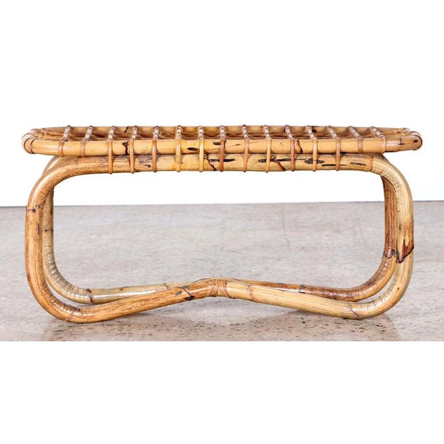 Unique mid-century modern bench made of bamboo with an X base. Made in 1950's. In the style of TITO AGNOLI. Purity and...