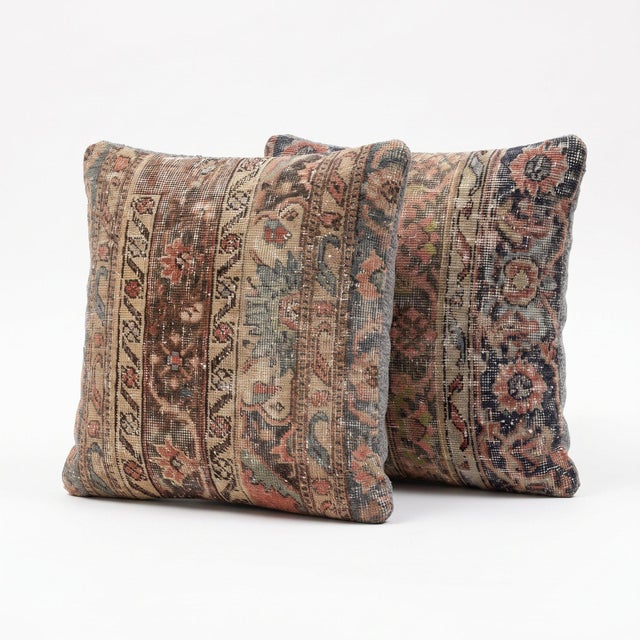 This 22'' x 22'' pillow cover set was made from authentic Turkish rug pieces — floral Oushak borders in rust, navy and...