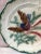 Lovely Majolica plate with bird and insect , leaves signed Saint Amand circa 1890.