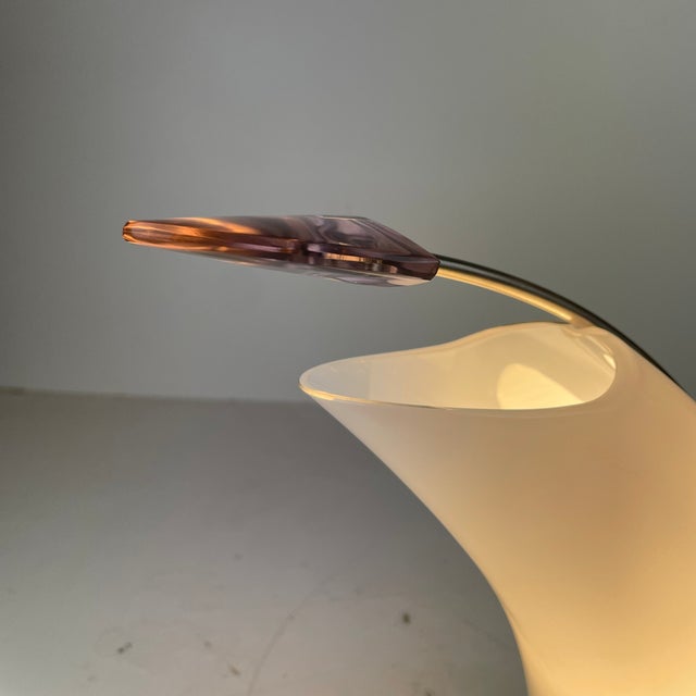 Really rare and spectacular table or desk lamp shaped as an asymmetrical cornucopia or wave, this model is made of white...