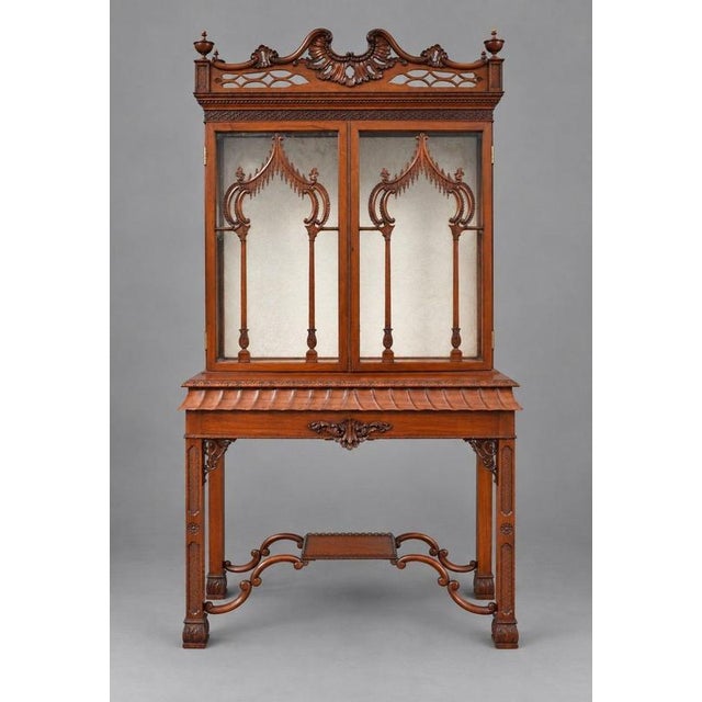 A striking late 19th century mahogany display cabinet in the Chinese Chippendale taste, circa 1880, of highly decorative...