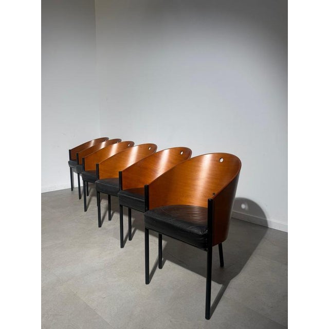 A beautiful set of six original Costes armchairs, designed by Philippe Starck for Driade. Featuring curved wooden shells...