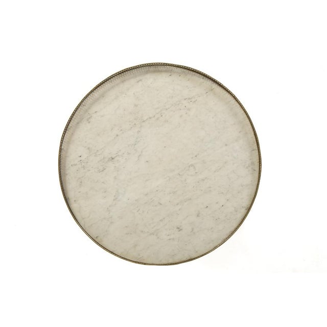 An Early 19th Century French Mahogany Guéridon with Marble Top. This gueridon is of extremely good quality and is...
