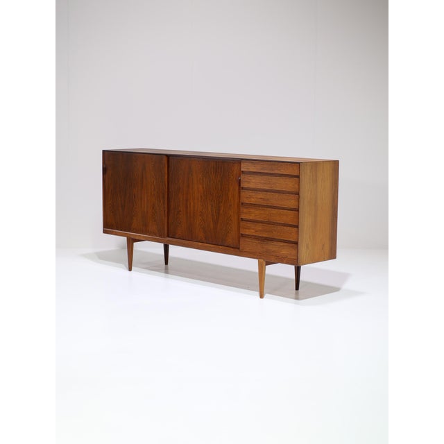 Rare sideboard (model 38) designed by Henry Rosengren Hansen for Brande Møbelfabrik, Denmark, 1960s. This highboard with...
