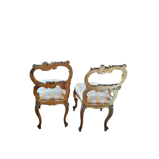 Late 19th Century A Pair of Rococo-Style, Gilded and Putti-Adorned Side Chairs For Sale - Image 5 of 12
