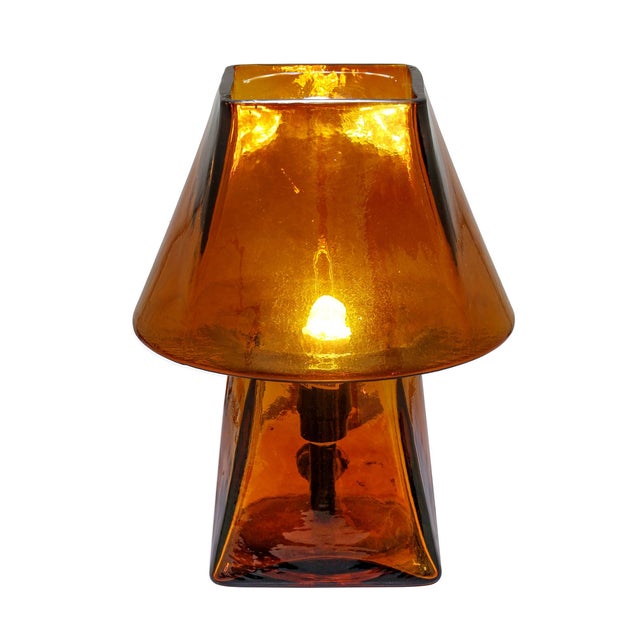 The Luca Glass Table Lamp turns everyday lighting into a little moment of magic. Crafted entirely from glass, it catches...